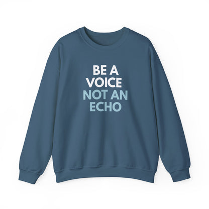 Indigo blue unisex crewneck sweatshirt with 'Be a Voice Not an Echo' white and blue text