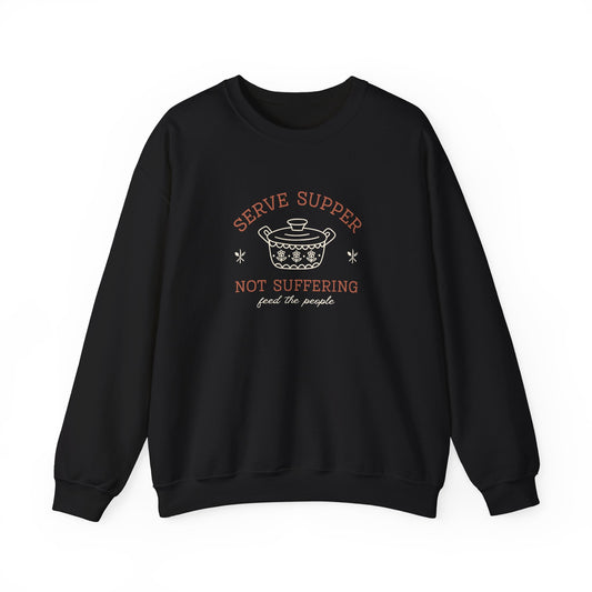 Black sweatshirt with a white vintage Pyrex illustration and dark orange and white text "serve supper, not suffering, feed the people"