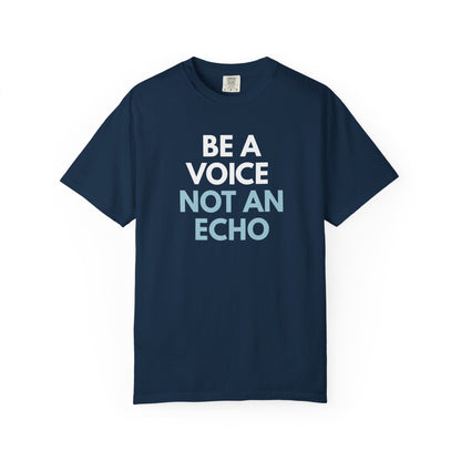 Navy blue unisex Comfort Colors t-shirt  with “Be a Voice, Not an Echo" blue and white text
