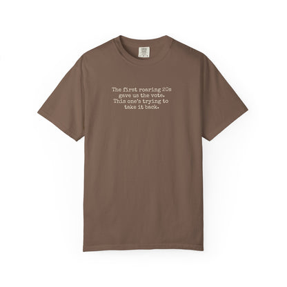Brown unisex Comfort Colors t-shirt  with "the first roaring 20s gave us the vote. this one's trying to take it back" cream text.