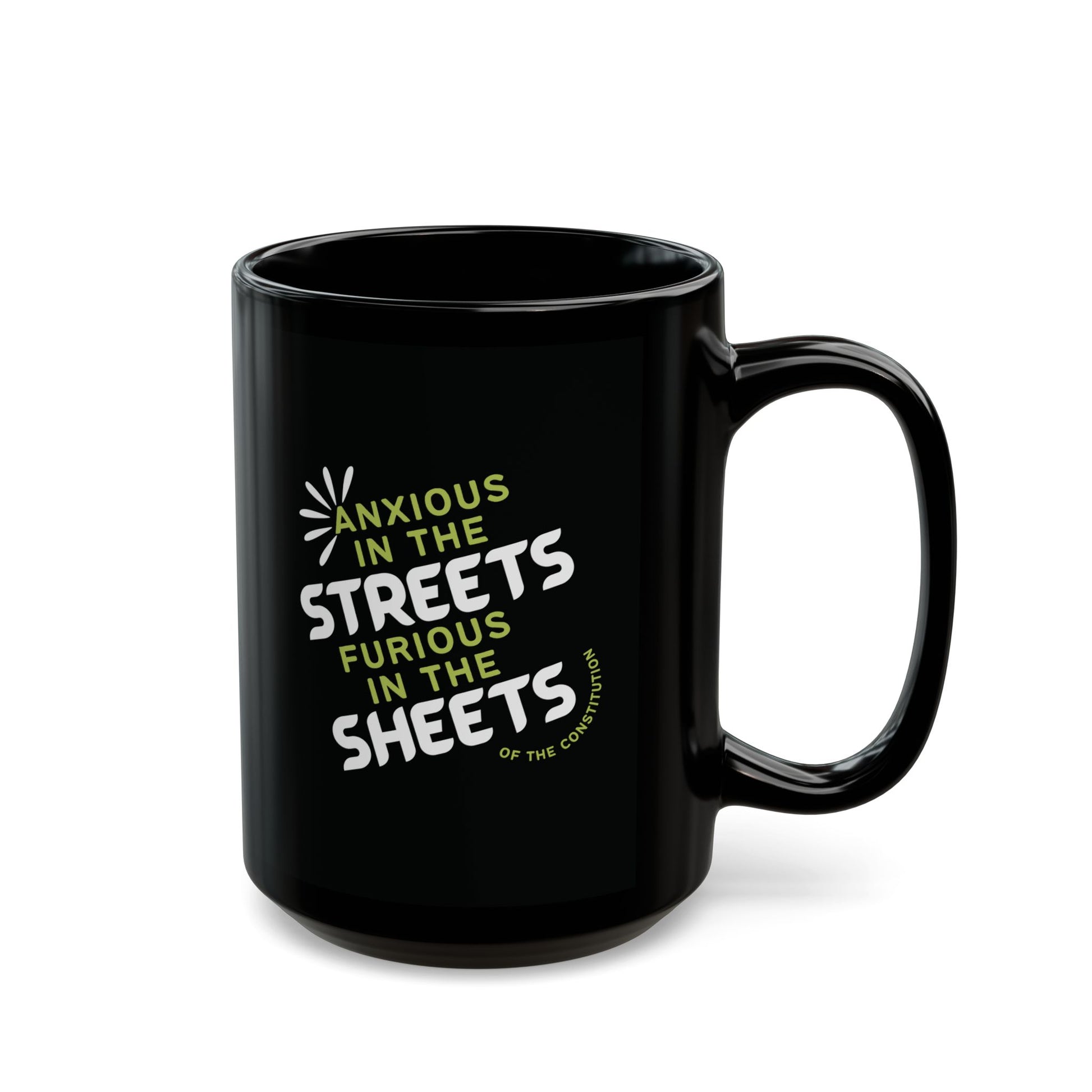 Black ceramic 15 oz coffee or tea mug with "anxious in the streets, furious in the sheets (of the constitution)" lime green and white text