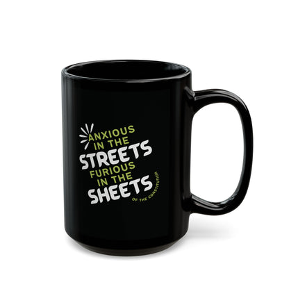 Black ceramic 15 oz coffee or tea mug with "anxious in the streets, furious in the sheets (of the constitution)" lime green and white text