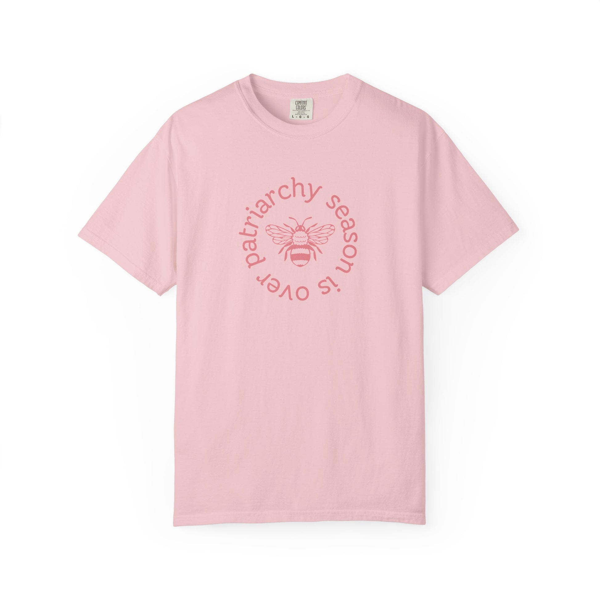 Light pink unisex Comfort Colors t-shirt pink "patriarchy season is over" text circling around a queen bee graphic 