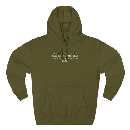 Green hoodie with cream text "the first roaring 20s gave us the vote. this one's trying to take it back."