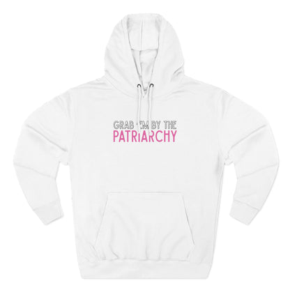 White hoodie with text 'Grab me by the Patriarchy' in white, black and pink