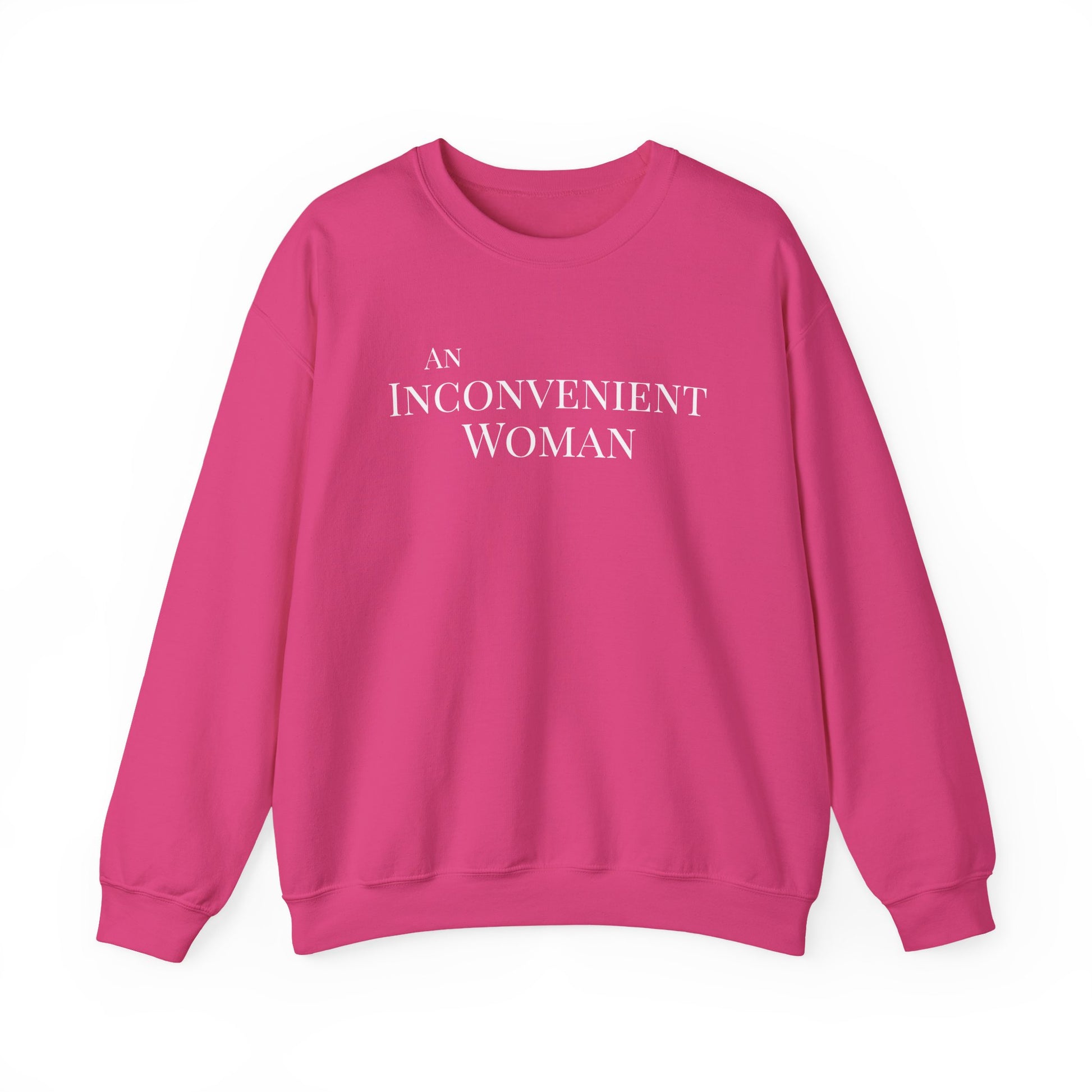 Hot pink sweatshirt with white text "An Inconvenient Woman"