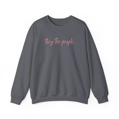 Gray unisex crewneck sweatshirt with 'They the people' text in pink 
