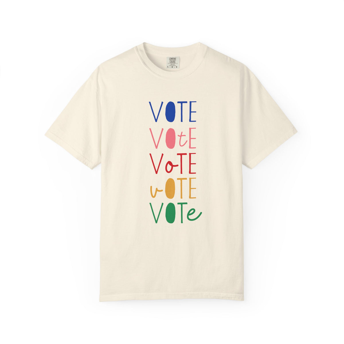 An off-white short-sleeve t-shirt with a vertical graphic spelling 'VOTE' in alternating blue, pink, red, yellow, and green colors, displayed on a clean white background.