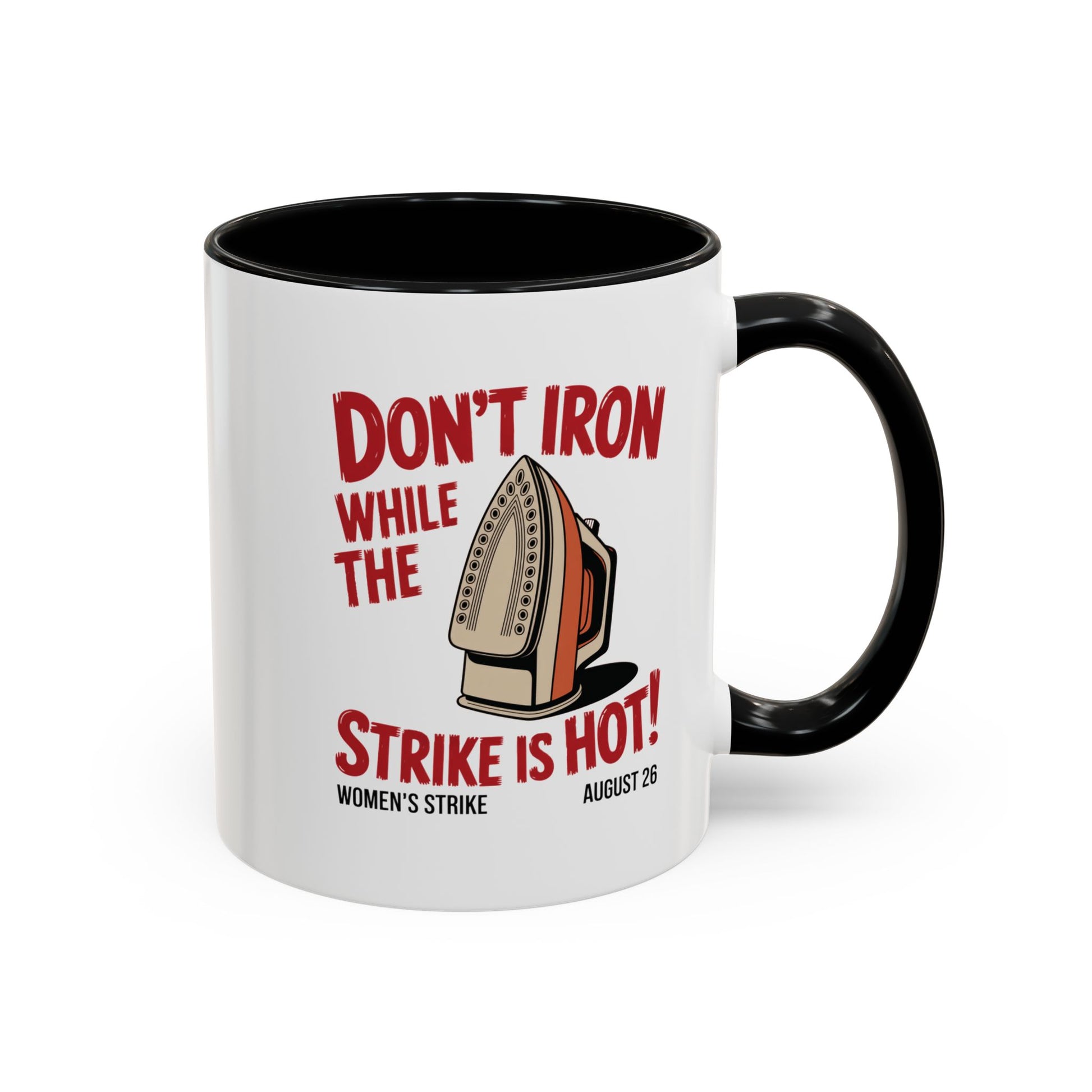 White ceramic 11 oz coffee or tea mug with black interior and handle with "don't iron while the strike is hot" red text and a vintage iron graphic
