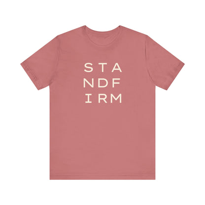 Pink t-shirt with cream 'STAND FIRM' text 