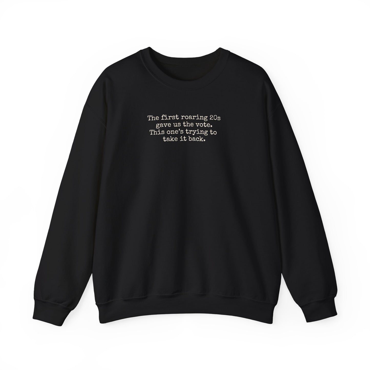 Black unisex crewneck sweatshirt with "the first roaring 20s gave us the vote. This one's trying to take it back" cream text