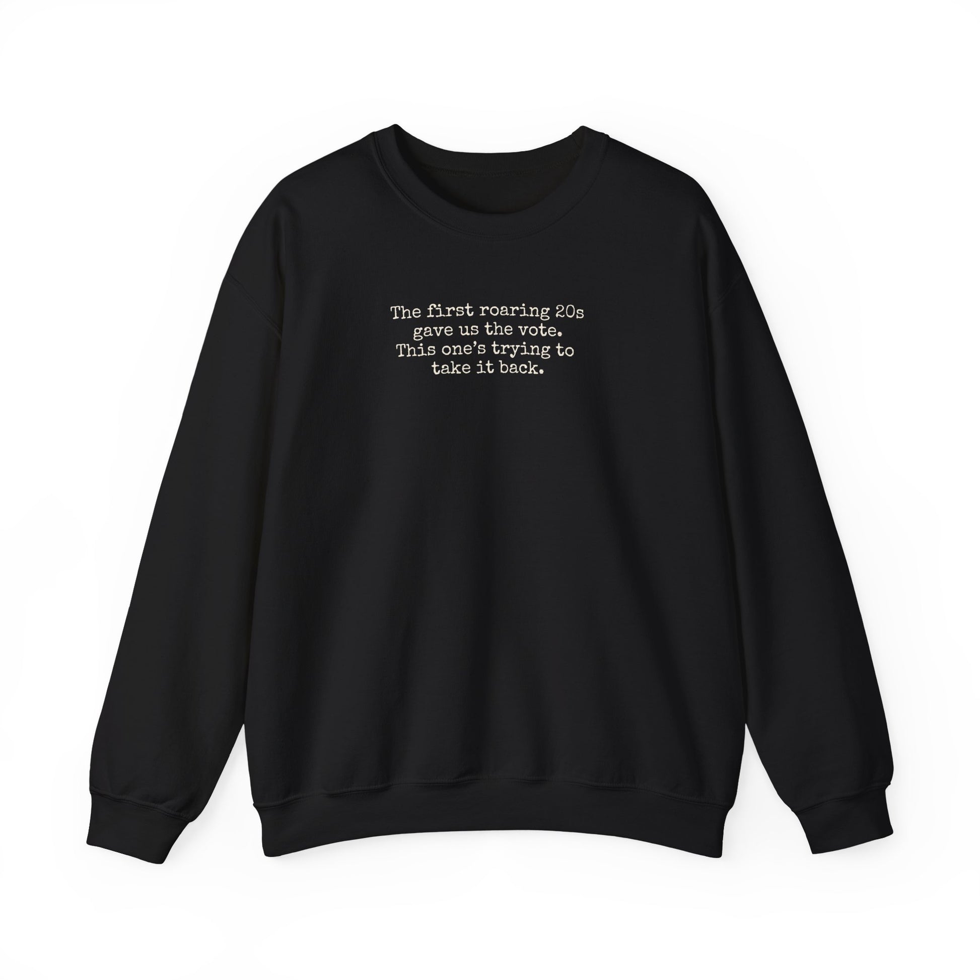 Black unisex crewneck sweatshirt with "the first roaring 20s gave us the vote. This one's trying to take it back" cream text