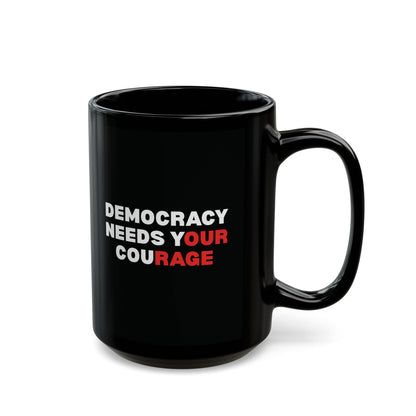 Black ceramic 15 oz coffee or tea mug with 'DEMOCRACY NEEDS YOUR COURAGE' white and red text