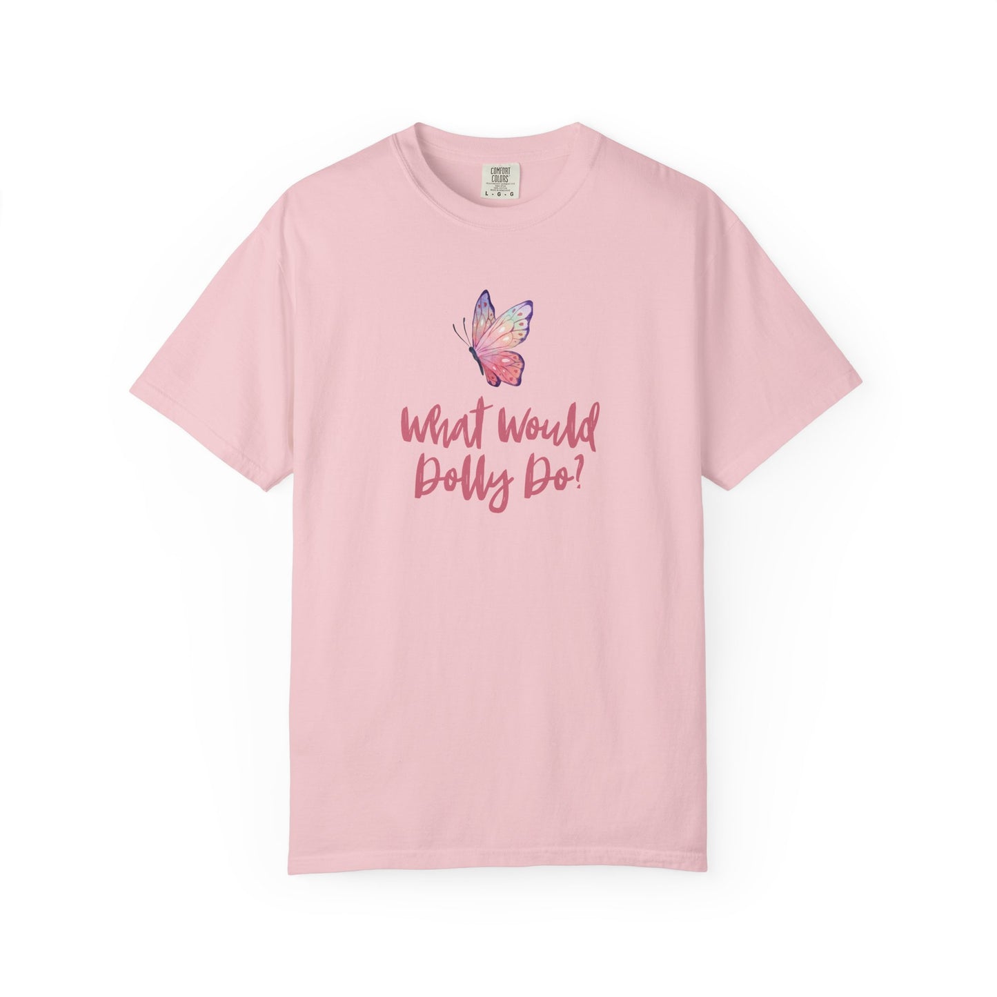 A light pink short-sleeve t-shirt with a pink butterfly graphic and the text 'What Would Dolly Do!' printed on the chest, displayed against a solid white background.