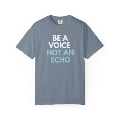 Blue unisex Comfort Colors t-shirt  with “Be a Voice, Not an Echo" light blue and white text
