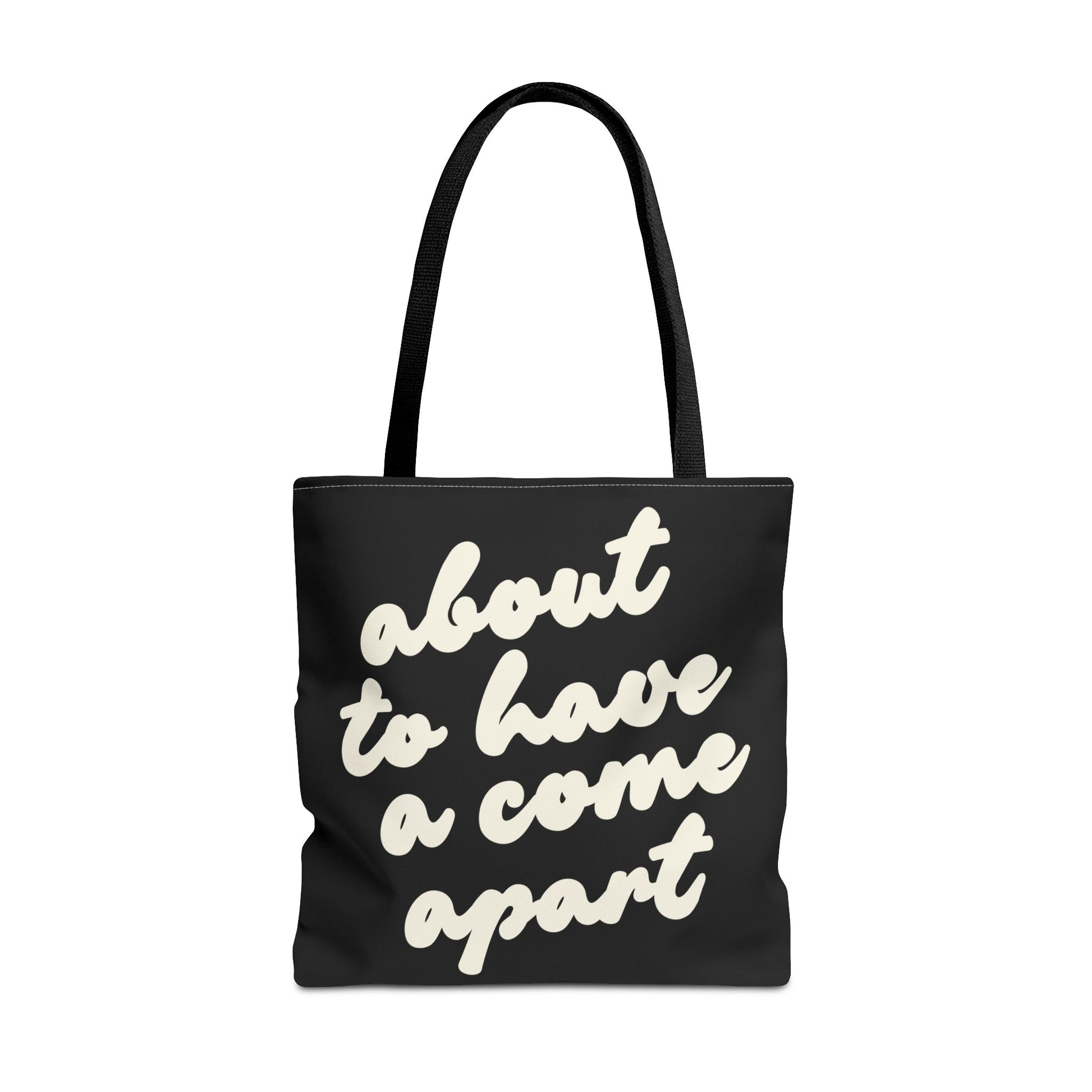 Black tote bag with "about to have a come apart" in cream text