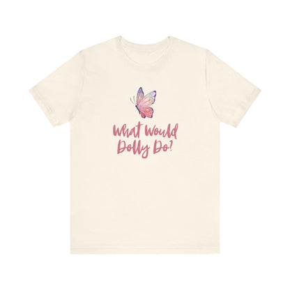 An off-white short-sleeve crewneck t-shirt featuring a pink and purple butterfly graphic above the pink cursive text 'What Would Dolly Do?'