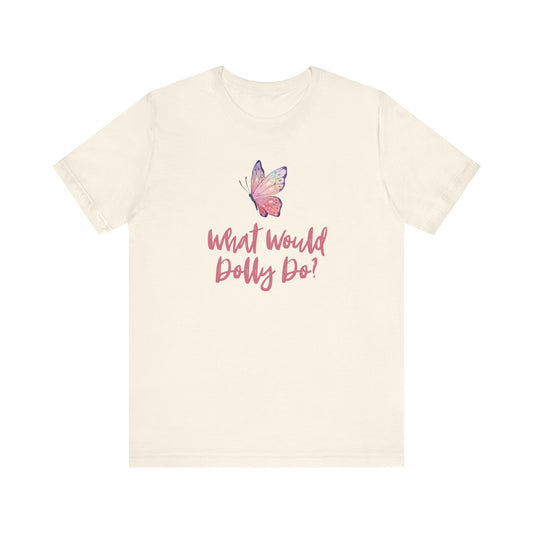 An off-white short-sleeve crewneck t-shirt featuring a pink and purple butterfly graphic above the pink cursive text 'What Would Dolly Do?'