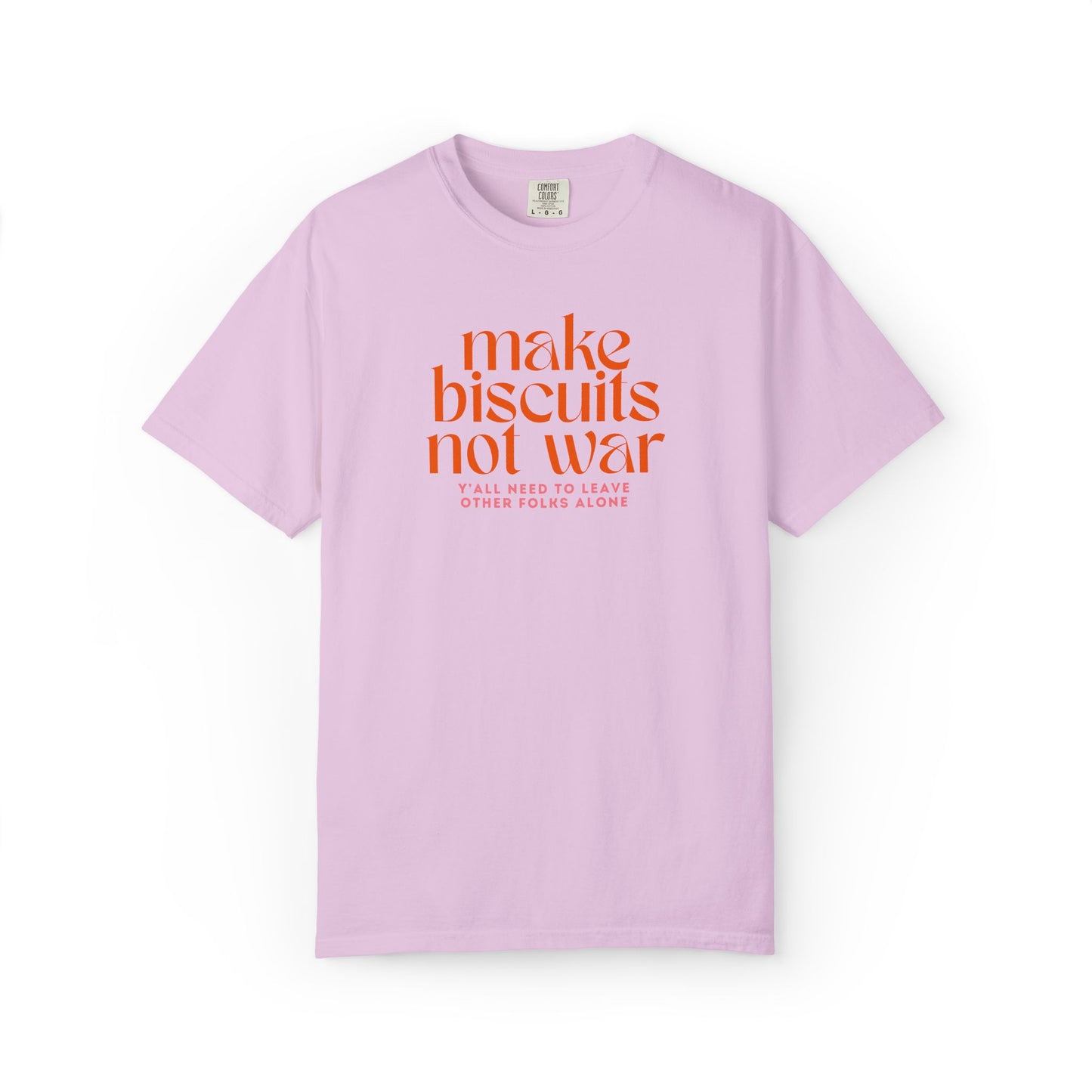 Lavender t-shirt with orange text 'make biscuits not war' with smaller pink text "y'all need to leave other folks alone" 
