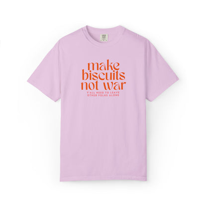 Lavender t-shirt with orange text 'make biscuits not war' with smaller pink text "y'all need to leave other folks alone" 