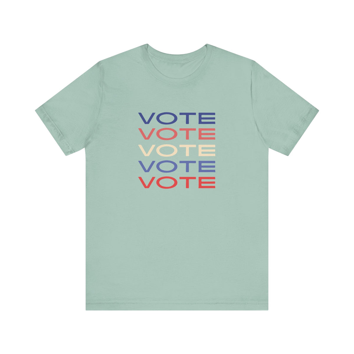 A light green short-sleeve crewneck t-shirt featuring a stacked graphic print of the word 'VOTE' in blue, red, and cream on the chest.