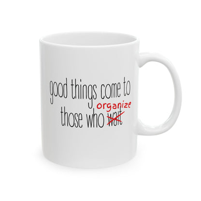 White ceramic 11 oz coffee or tea mug with 'good things come to those who organize' black and red text