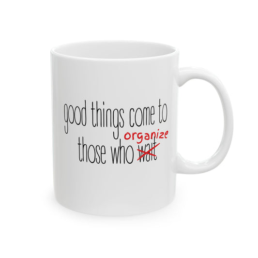 White ceramic 11 oz coffee or tea mug with 'good things come to those who organize' black and red text