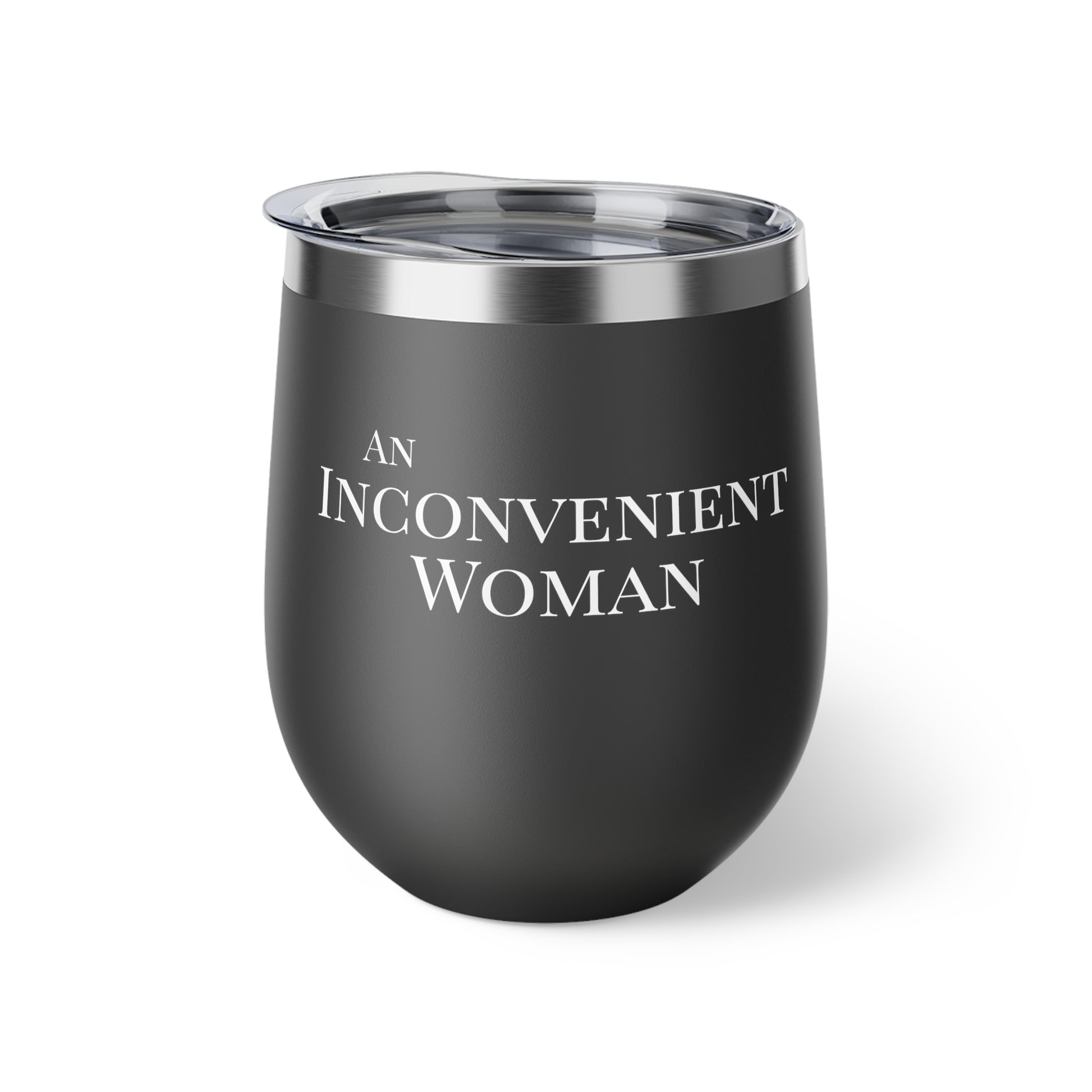 Black tumbler with white text "An Inconvenient Woman"