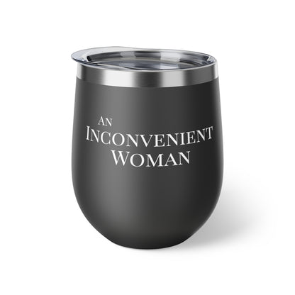 Black tumbler with white text "An Inconvenient Woman"