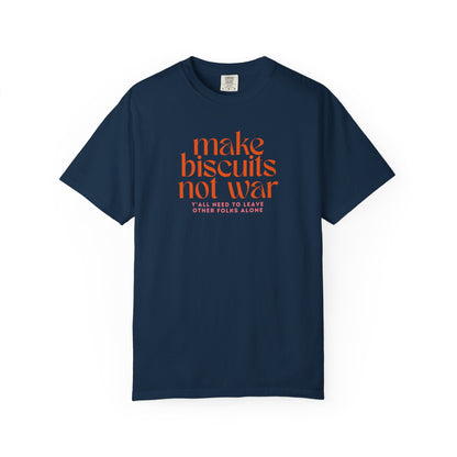 Navy blue t-shirt with orange text 'make biscuits not war' with smaller pink text "y'all need to leave other folks alone" 