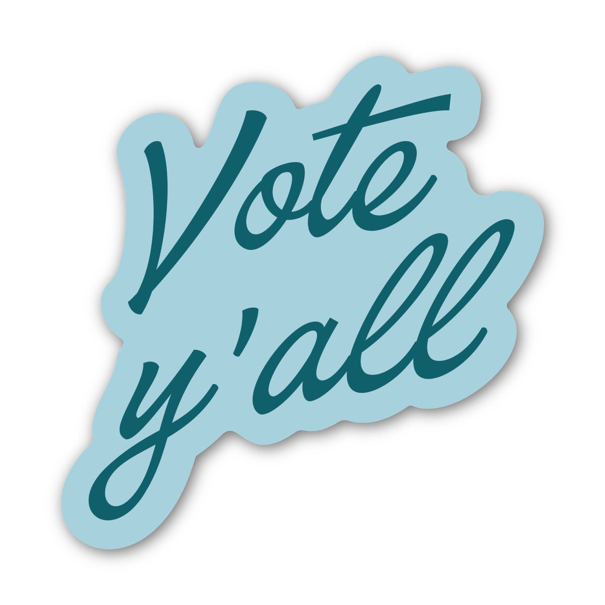 A die-cut sticker with the phrase 'Vote y'all' in dark teal script on a light blue background, shown on a plain white backdrop.